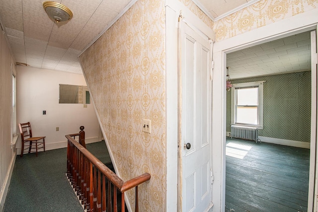 4 Walnut St, Exeter, NH 03833 - hall featuring radiator, wallpapered walls, an upstairs landing, dark wood-style floors, and crown molding