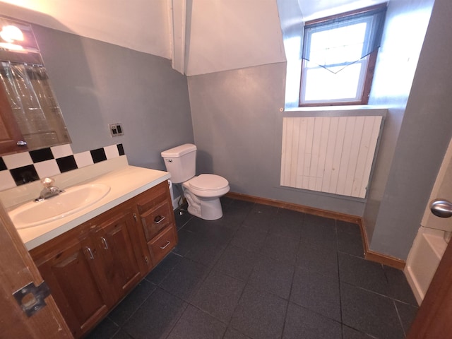 793 S Beech St, Manchester, NH 03104 - bathroom with vanity, curtained shower, tasteful backsplash, and tile patterned floors