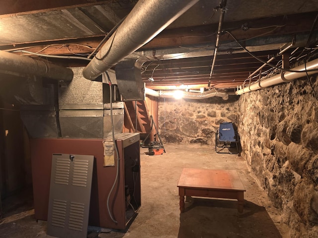 793 S Beech St, Manchester, NH 03104 - unfinished basement featuring heating unit
