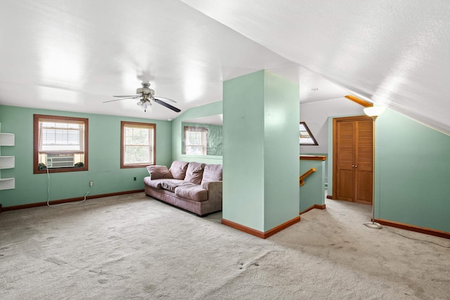 793 S Beech St, Manchester, NH 03104 - carpeted living area with vaulted ceiling, a ceiling fan, and cooling unit