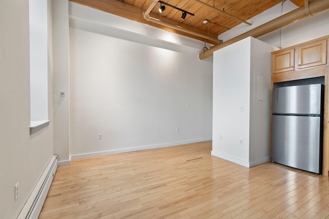 156 Front St Unit 103, Exeter, NH 03833 - empty room with a baseboard heating unit, a wooden ceiling with exposed beams, light wood-style floors, and rail lighting