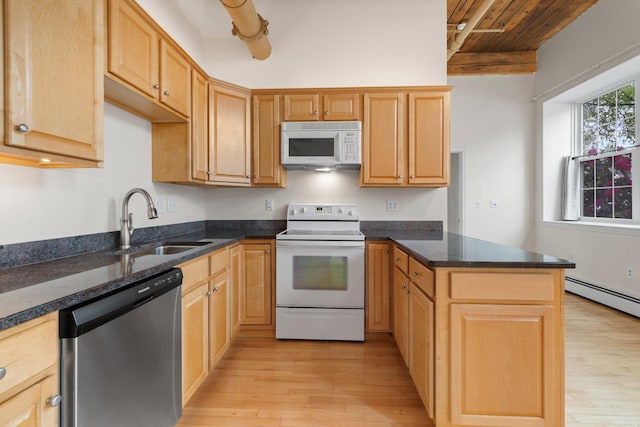 156 Front St Unit 103, Exeter, NH 03833 - kitchen with white appliances, a peninsula, light wood-style floors, a wood ceiling with exposed beams, and baseboard heating
