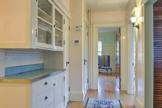 45 School St, Keene, NH 03431 - hallway featuring light wood-style floors and ornamental molding