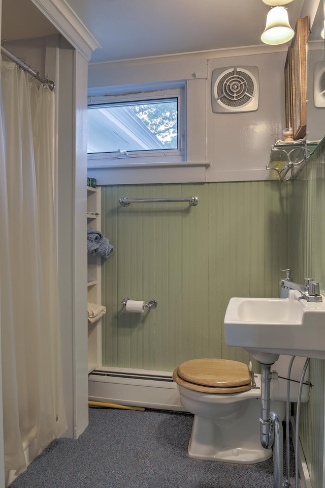 45 School St, Keene, NH 03431 - full bath featuring baseboard heating, wainscoting, curtained shower, and wood walls