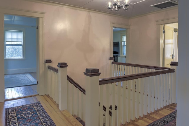 45 School St, Keene, NH 03431 - stairs featuring hardwood / wood-style floors and a chandelier