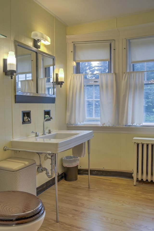 45 School St, Keene, NH 03431 - bathroom with radiator, wood finished floors, and crown molding