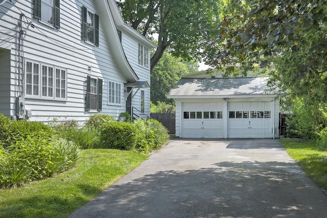 45 School St, Keene, NH 03431 - view of home's exterior with an outbuilding and a garage