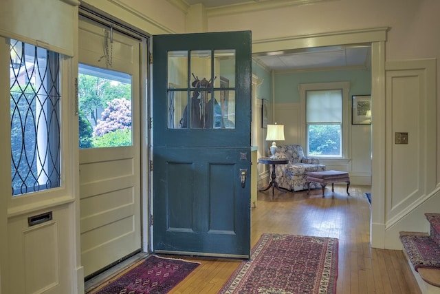 45 School St, Keene, NH 03431 - entrance foyer featuring ornamental molding and hardwood / wood-style floors