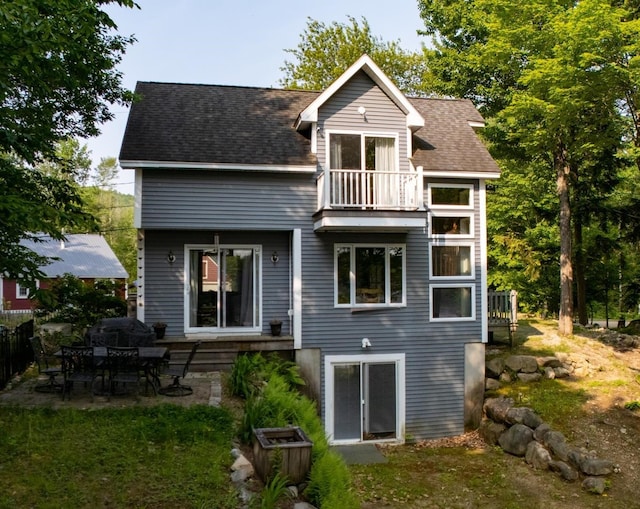 26 Island Dr, Madison, NH 03849 - back of property featuring a balcony and roof with shingles