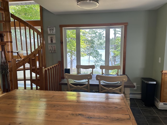 26 Island Dr, Madison, NH 03849 - dining area featuring dark tile patterned floors, baseboard heating, and a water view