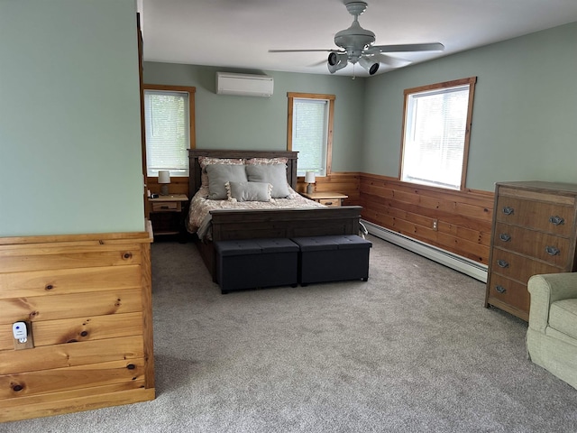 26 Island Dr, Madison, NH 03849 - bedroom featuring a wall mounted air conditioner, a baseboard heating unit, carpet, a wainscoted wall, and ceiling fan