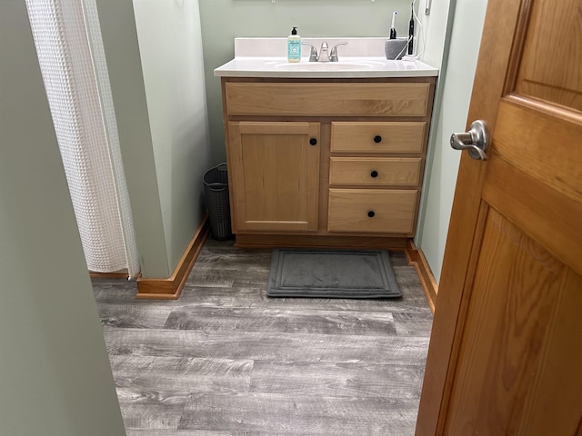 26 Island Dr, Madison, NH 03849 - bathroom with wood finished floors and vanity