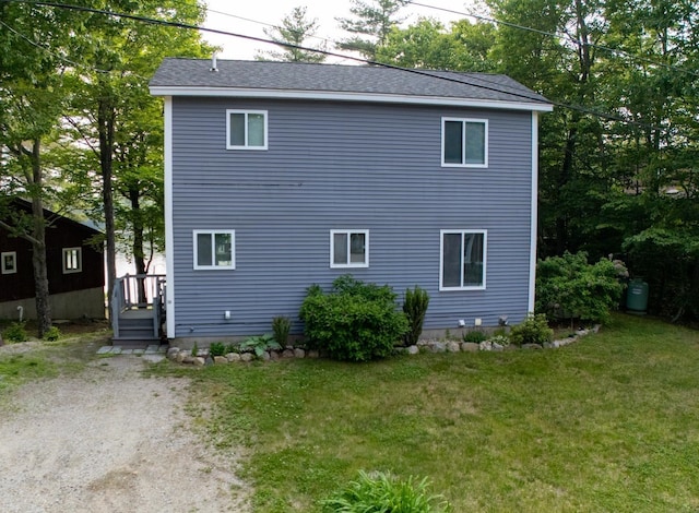 26 Island Dr, Madison, NH 03849 - view of side of home featuring a lawn and a shingled roof