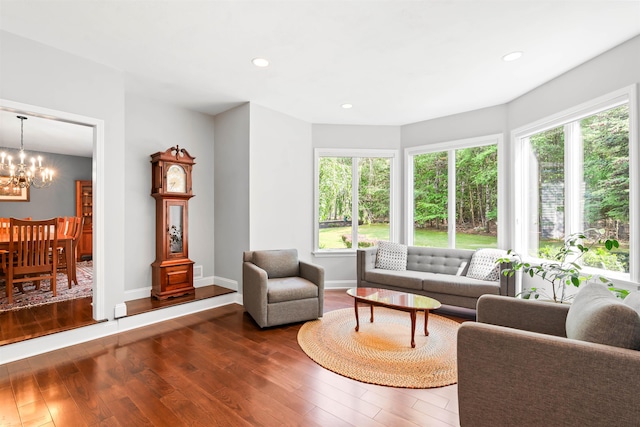 9 Hubbard Rd, Amherst, NH 03031 - living room featuring dark wood-style floors, healthy amount of natural light, a chandelier, and recessed lighting