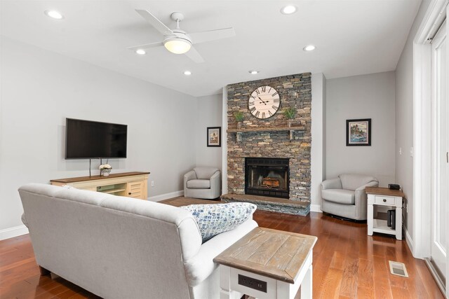 9 Hubbard Rd, Amherst, NH 03031 - living room with a fireplace, a ceiling fan, wood finished floors, and recessed lighting