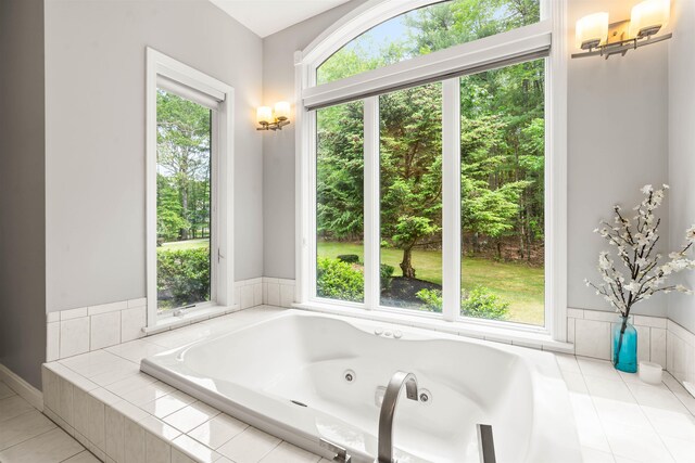 9 Hubbard Rd, Amherst, NH 03031 - bathroom with a tub with jets and tile patterned flooring