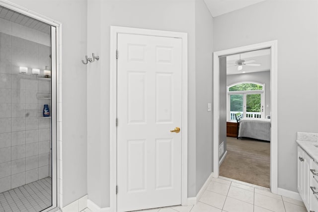 9 Hubbard Rd, Amherst, NH 03031 - full bath with vanity, a stall shower, connected bathroom, ceiling fan, and tile patterned flooring