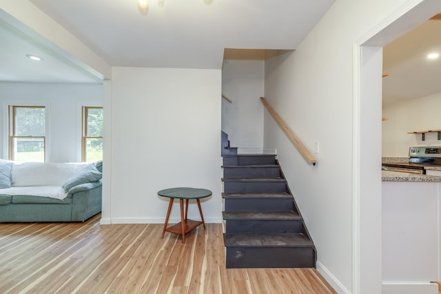 53 Broad Cove Dr, Concord, NH 03303 - staircase with wood finished floors and recessed lighting
