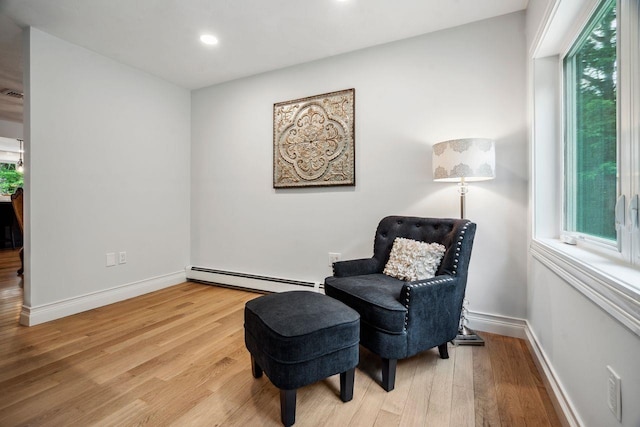10 Lawrence Ln, Hollis, NH 03049 - living area featuring a baseboard radiator, light wood-style floors, and recessed lighting