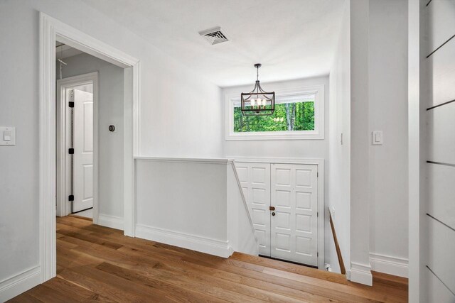 10 Lawrence Ln, Hollis, NH 03049 - entryway with a chandelier and wood finished floors