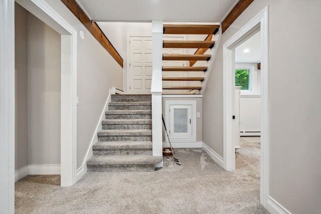 10 Lawrence Ln, Hollis, NH 03049 - stairs with carpet and baseboard heating