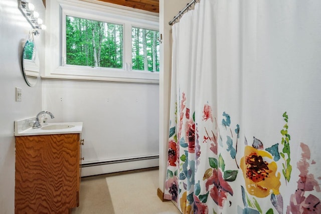 10 Lawrence Ln, Hollis, NH 03049 - full bathroom featuring a baseboard radiator, vanity, and a shower with shower curtain