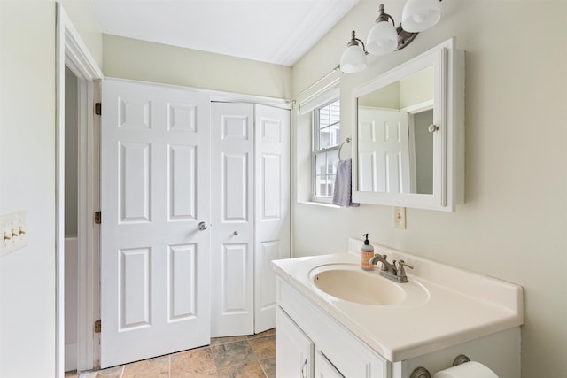 78 Lyman Park Rd Unit 1, Hinesburg, VT 05461 - bathroom with vanity and stone finish floors