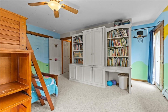 429 Polhemus Rd, Cambridge, VT 05464 - carpeted bedroom with two closets, a baseboard heating unit, and a ceiling fan