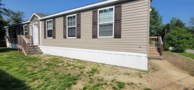 5 Mildred Ave, Raymond, NH 03077 - view of side of property featuring a lawn