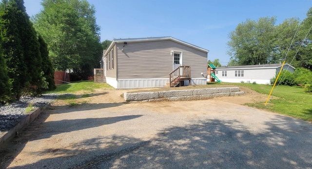 5 Mildred Ave, Raymond, NH 03077 - rear view of property featuring a lawn