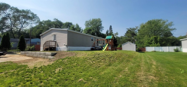 5 Mildred Ave, Raymond, NH 03077 - view of side of property featuring a playground and a storage shed