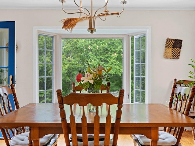 89 Carlson Rd, Worcester, VT 05682 - dining space featuring a chandelier, healthy amount of natural light, and crown molding