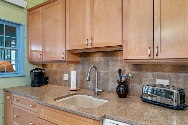 310 Bear Is, Meredith, NH 03253 - kitchen featuring light stone countertops, tasteful backsplash, and light brown cabinetry