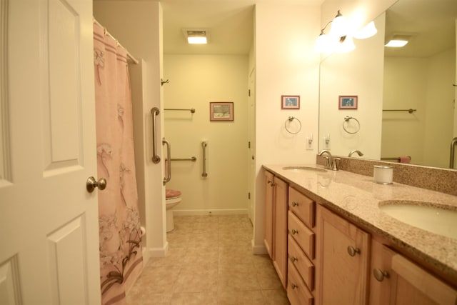 51 Fielding Ln, South Burlington, VT 05403 - full bathroom with double vanity and tile patterned floors