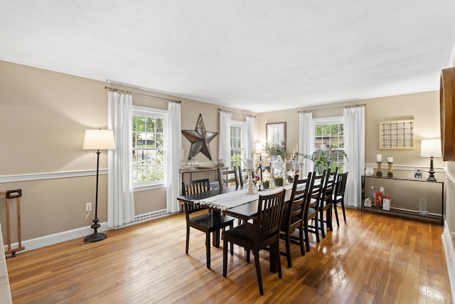 38 Piscataqua Rd, Dover, NH 03820 - dining room with wood-type flooring and baseboards
