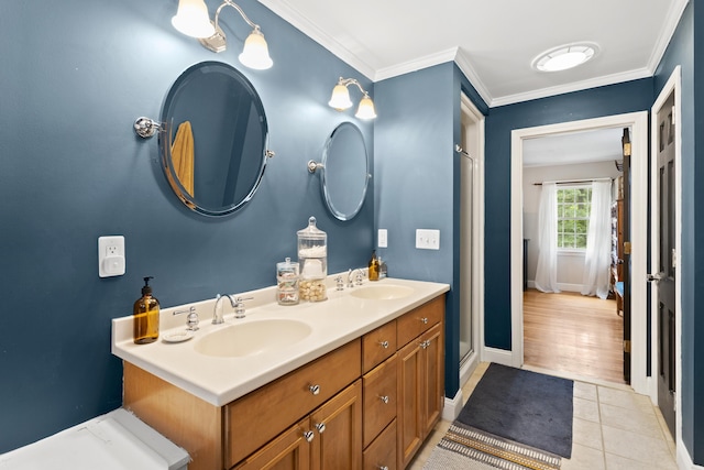 38 Piscataqua Rd, Dover, NH 03820 - full bath with double vanity, tile patterned flooring, ornamental molding, and a shower with shower door