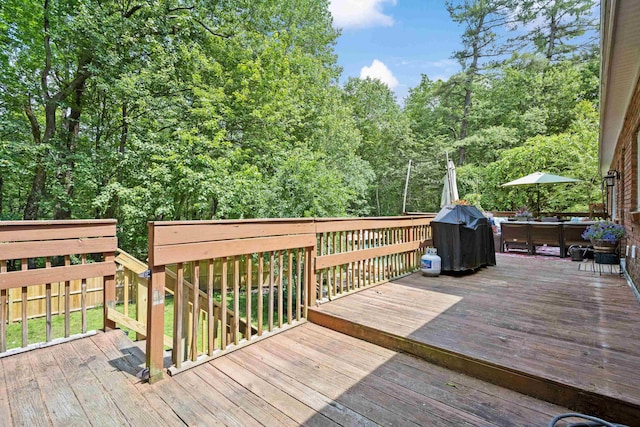 38 Piscataqua Rd, Dover, NH 03820 - wooden deck with grilling area and a view of trees