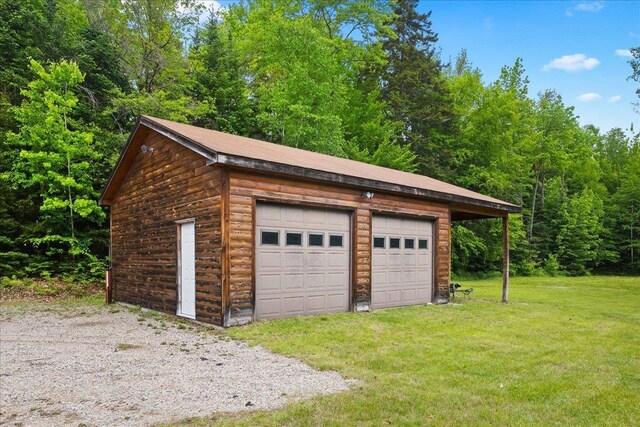 110 W Milan Rd, Milan, NH 03588 - detached garage featuring a wooded view