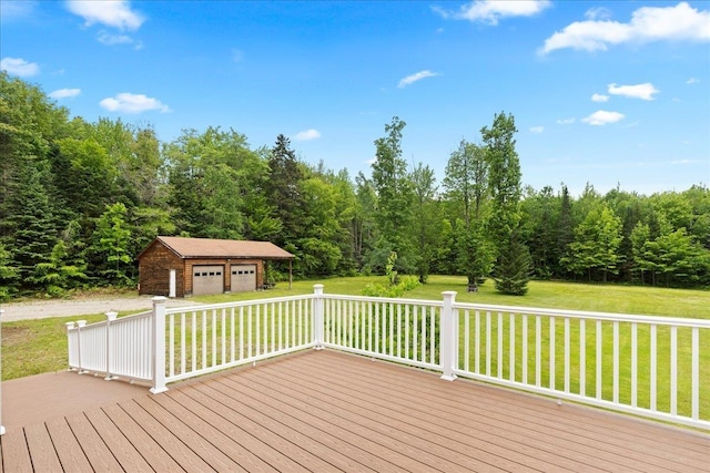 110 W Milan Rd, Milan, NH 03588 - wooden terrace featuring a garage, an outdoor structure, a lawn, and a forest view