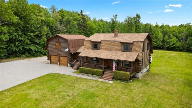 110 W Milan Rd, Milan, NH 03588 - cabin featuring a porch, a gambrel roof, log exterior, and a chimney