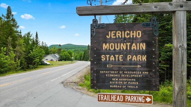 110 W Milan Rd, Milan, NH 03588 - exterior view of a mountain backdrop