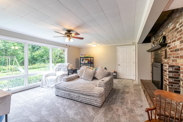 28 New Searles Rd, Nashua, NH 03062 - carpeted living room with a brick fireplace, a ceiling fan, and crown molding