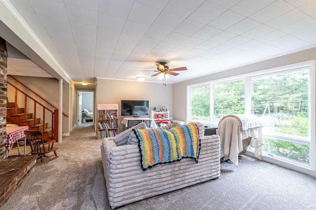 28 New Searles Rd, Nashua, NH 03062 - living room featuring carpet, a ceiling fan, and stairs