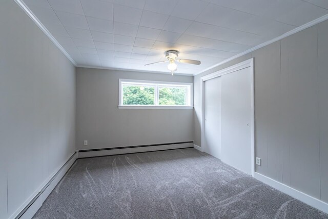 28 New Searles Rd, Nashua, NH 03062 - unfurnished bedroom featuring crown molding, carpet floors, baseboard heating, and a closet