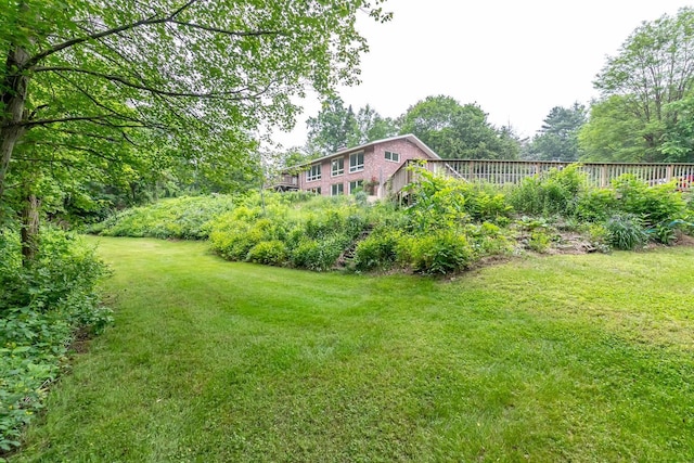 28 New Searles Rd, Nashua, NH 03062 - view of green lawn with a deck
