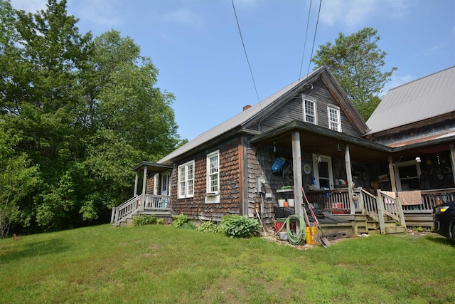 151 Sunset Rock Rd, Lebanon, NH 03766 - view of front of property featuring covered porch and a front yard
