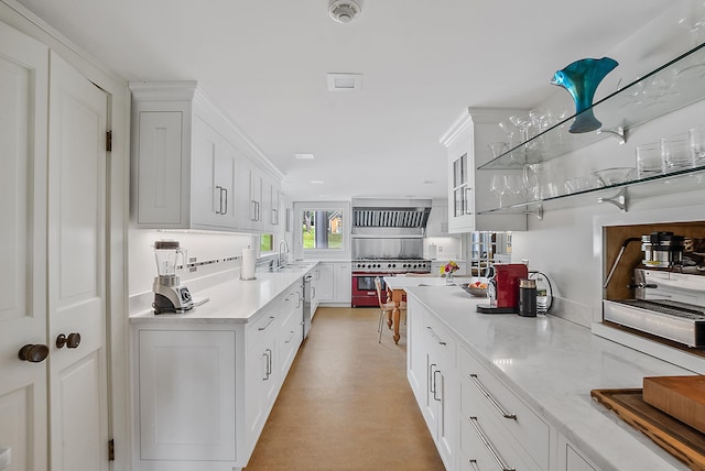 2 Croydon Brook Rd, Newport, NH 03773 - kitchen with appliances with stainless steel finishes, white cabinetry, glass insert cabinets, backsplash, and light stone counters