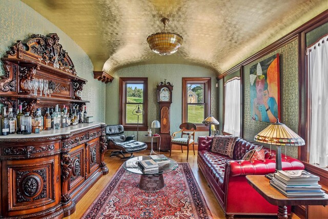 2 Croydon Brook Rd, Newport, NH 03773 - living room featuring lofted ceiling, light wood-style floors, and a bar