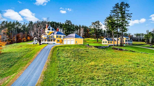 2 Croydon Brook Rd, Newport, NH 03773 - view of front of home featuring asphalt driveway, a front lawn, view of wooded area, and an outdoor structure