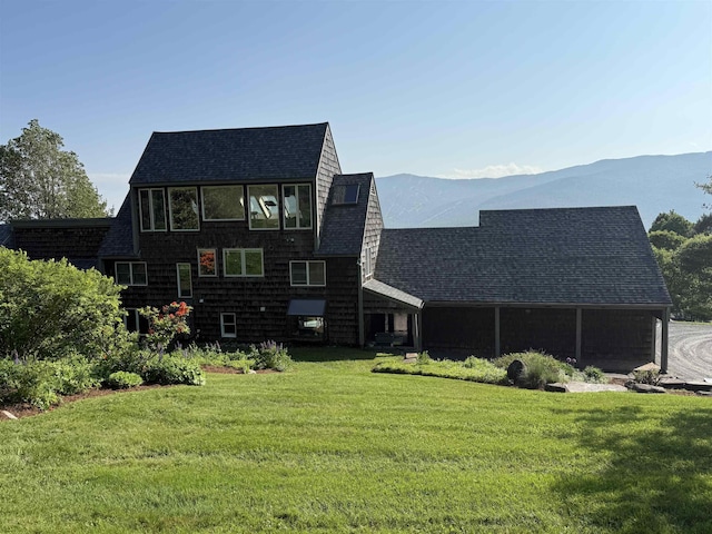 572 Stagecoach Rd, Fayston, VT 05673 - view of front of property featuring roof with shingles, a front lawn, and a mountain view